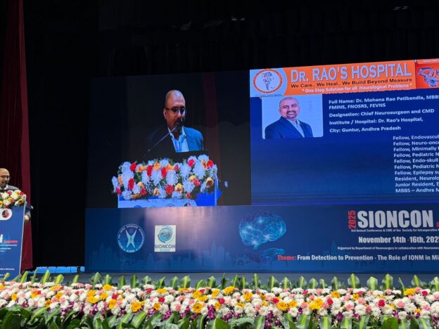 Dr. Mohana Rao Patibandla standing at the podium at SIONCON 2025 in Bengaluru, with a large screen displaying his professional profile, qualifications, and fellowships from leading global neurosurgery centers.