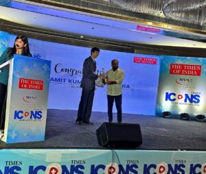 Dr Amit Kumar Thotakura receiving Times ICONs of Healthcare 2026 award from Andhra Pradesh Health Minister Satya Kumar Yadav