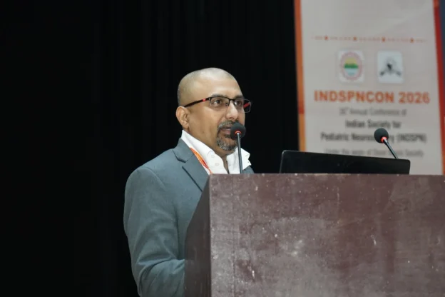 Dr Mohana Rao Patibandla speaking at INDSPNCON 2026 about advanced pediatric neurosurgery techniques including minimally invasive brain surgery and neuro-navigation at Dr Rao’s International Institute of Neurosciences