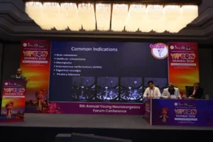 YNFCON Dr. Mohana Rao Patibandla presenting common indications for stereotactic radiosurgery at YNFCON 2026 Mumbai, including brain metastases, vestibular schwannoma, meningioma, AVMs, trigeminal neuralgia, and pituitary adenoma.
