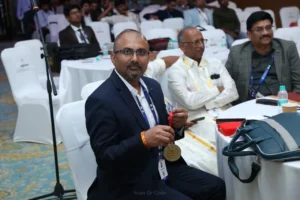 dr-rao-showing-cosscon-gold-medal-to-press-at-2026-conference.jpg Dr. Rao holding and showing the COSSCON 2026 Best Paper Gold Medal to the press at the PASMISS–MISSABCON–COSSCON scientific meeting in Chennai.